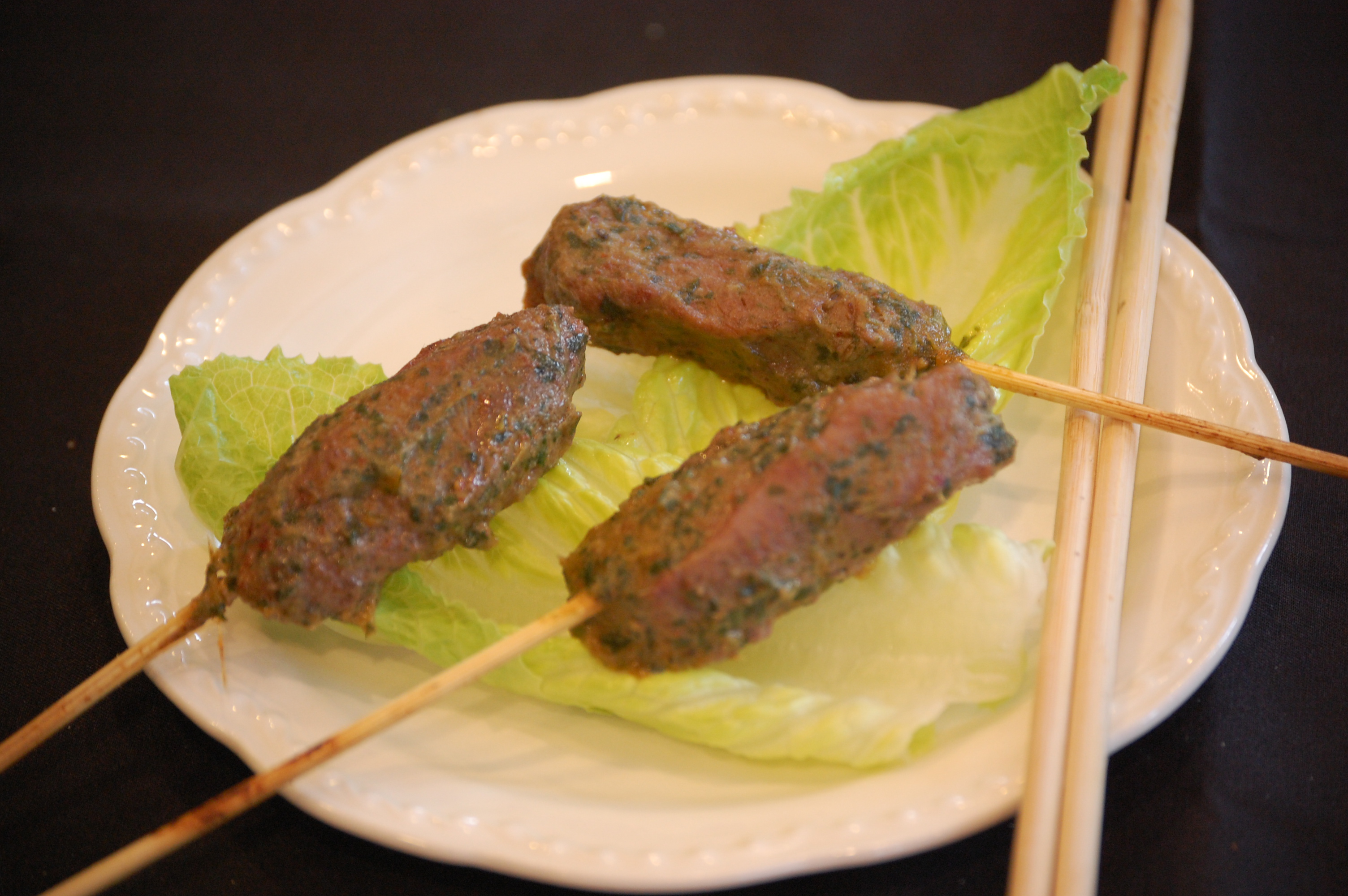 Red Thai Curry Beef on a Wooden Skewer product image