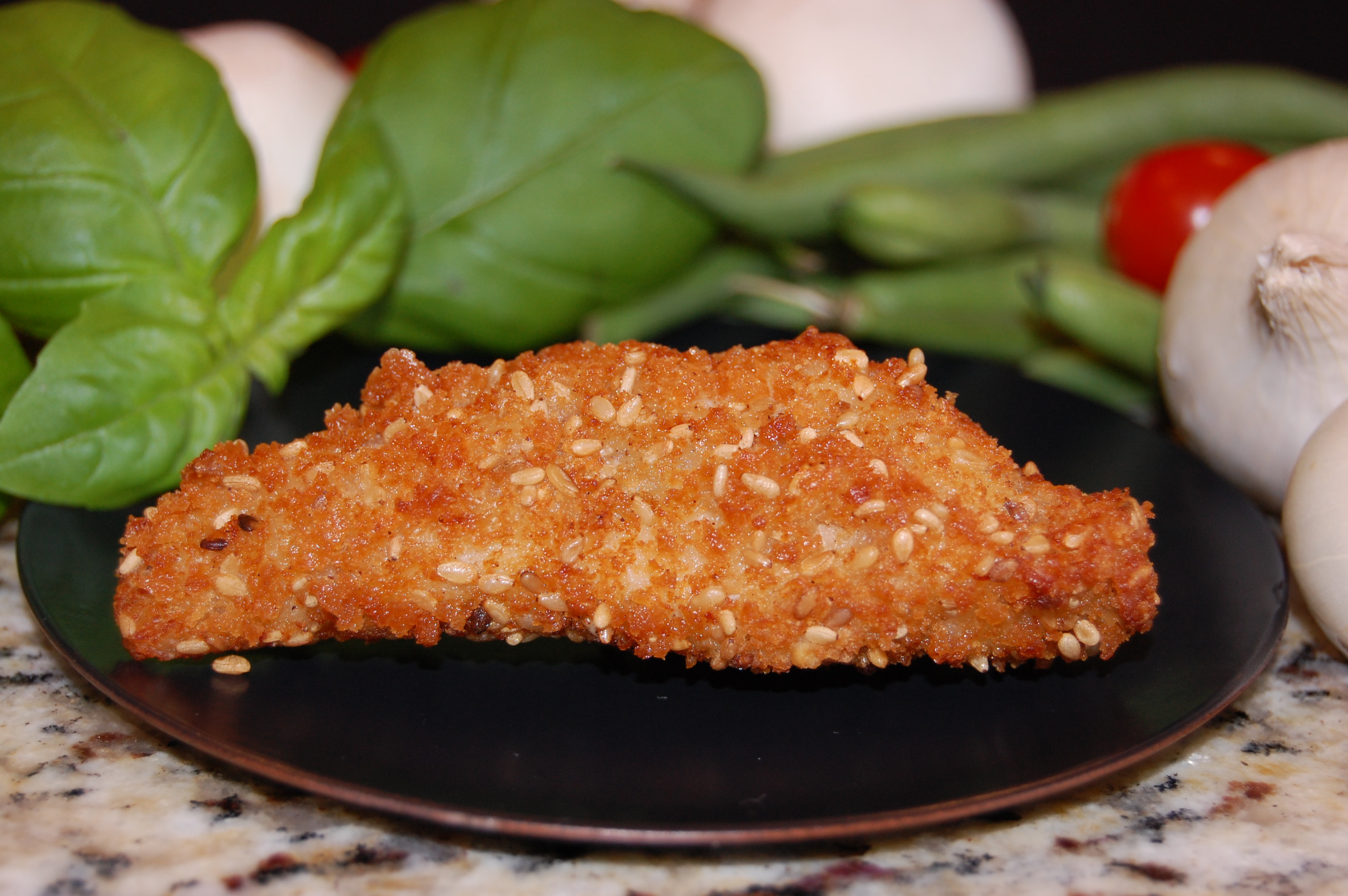 Sesame Chicken Placed on a Wooden Skewer product image